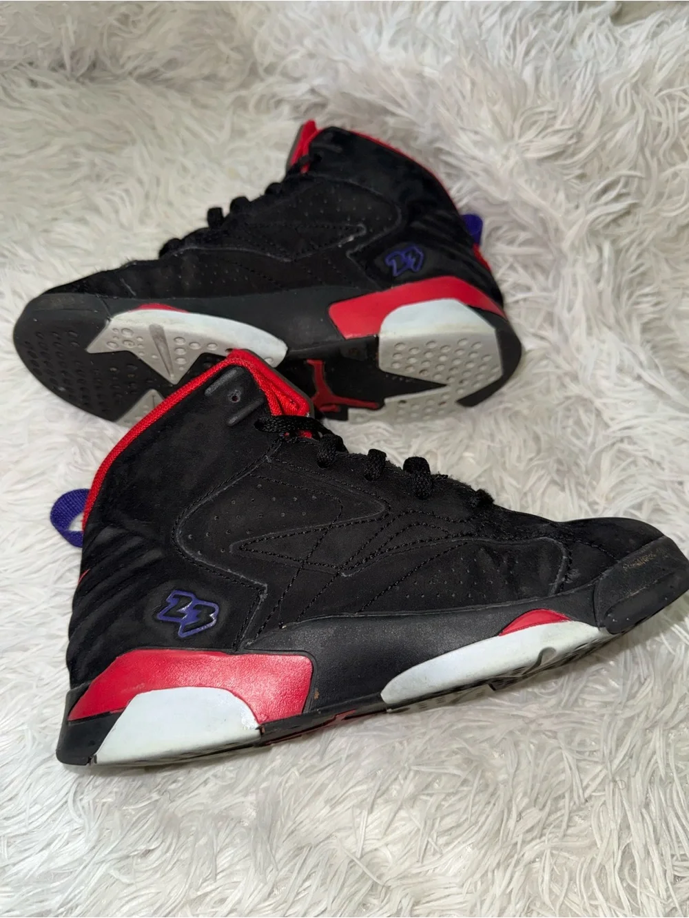 Nike Kids Black Sneakers with Red Lining and Purple Heel Tabs